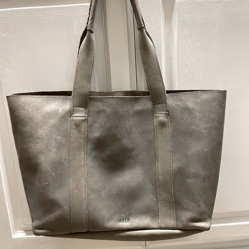 ABLE brand large leather tote. Grayish brown color. Great condition.